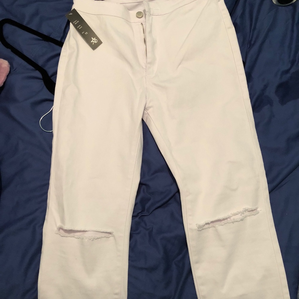 White Skinny Jeans with holes in knees